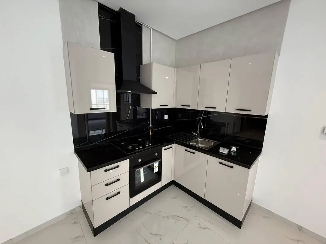 📍ENNASR 2  : APPARTEMENT S+1 HAUT STANDING JAMAIS HABITÉ A LOUER - Photo 3