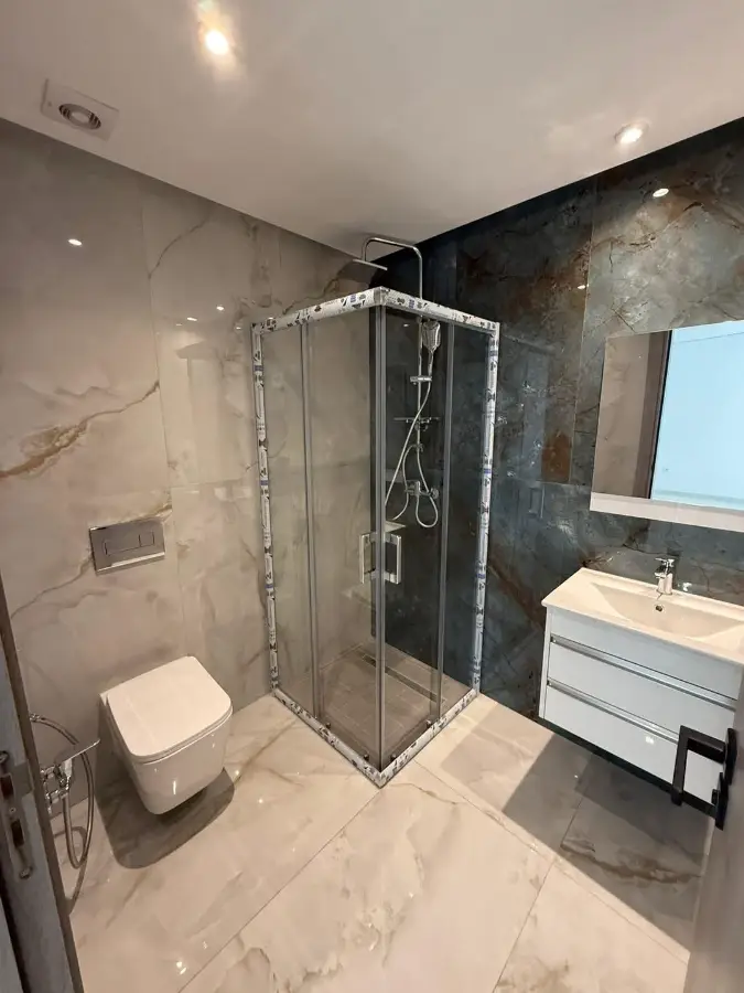 📍ENNASR 2  : APPARTEMENT S+1 HAUT STANDING JAMAIS HABITÉ A LOUER - Photo 4