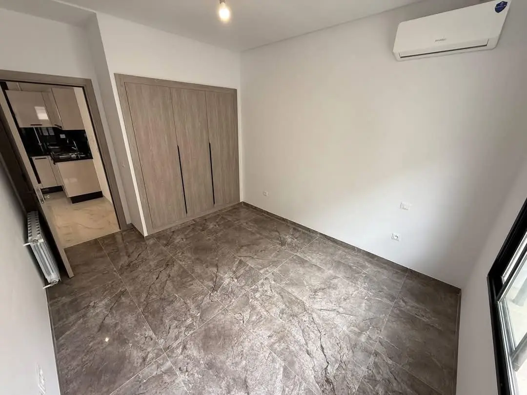 📍ENNASR 2  : APPARTEMENT S+1 HAUT STANDING JAMAIS HABITÉ A LOUER - Photo 6