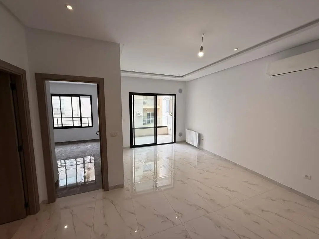 📍ENNASR 2  : APPARTEMENT S+1 HAUT STANDING JAMAIS HABITÉ A LOUER - Photo 7