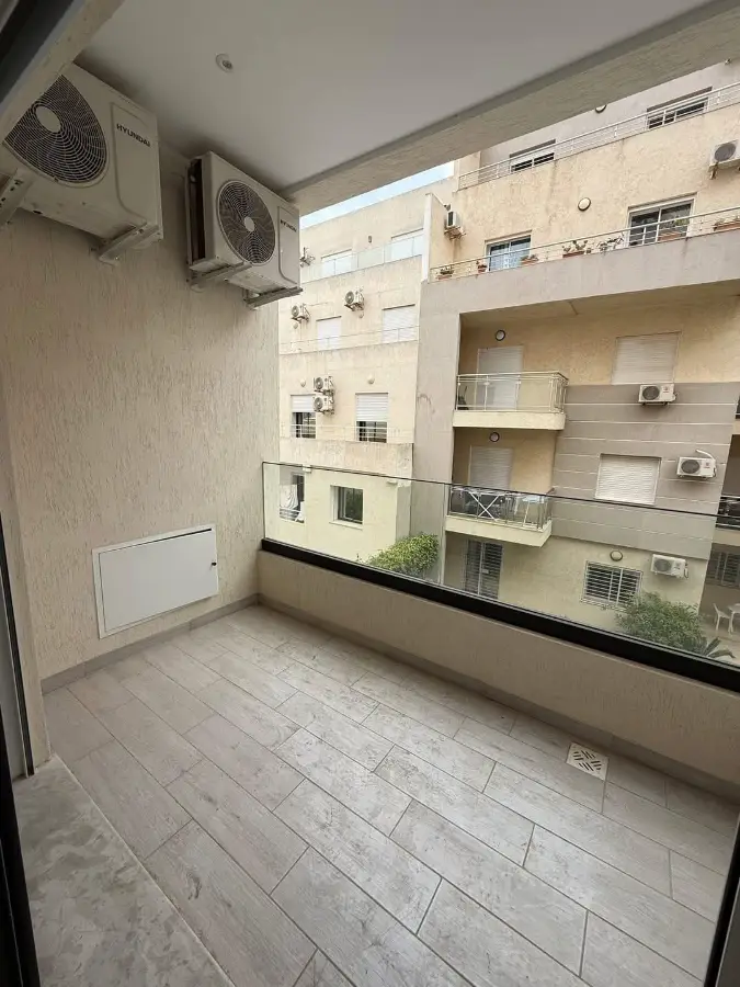 📍ENNASR 2  : APPARTEMENT S+1 HAUT STANDING JAMAIS HABITÉ A LOUER - Photo 8