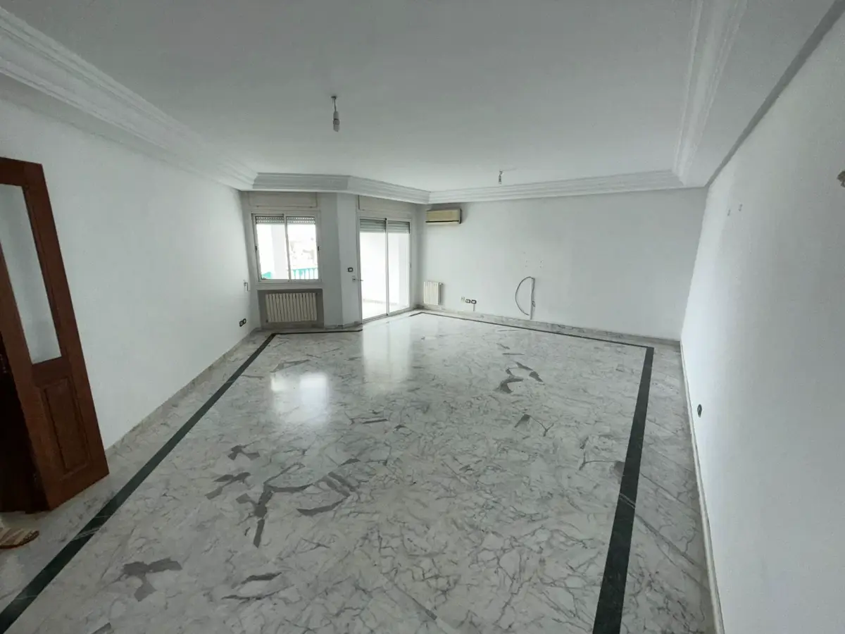 📍 ENNASR 1 : APPARTEMENT S+3 AVEC JARDIN A VENDRE - Photo 4